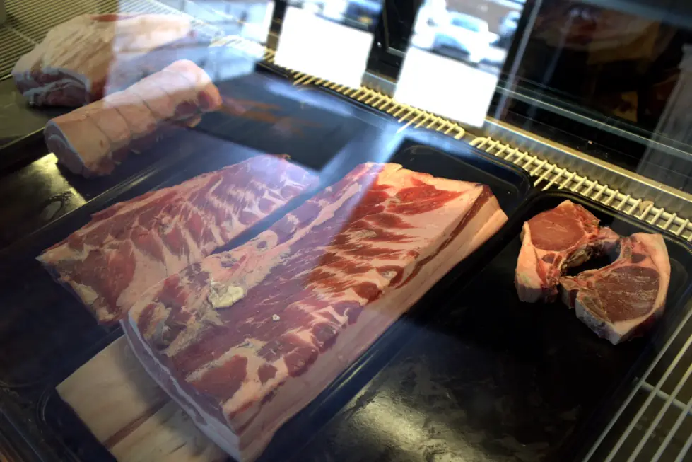 The butcher case at The Butcher's Pantry, whole cuts and thick chops laid out on the tray