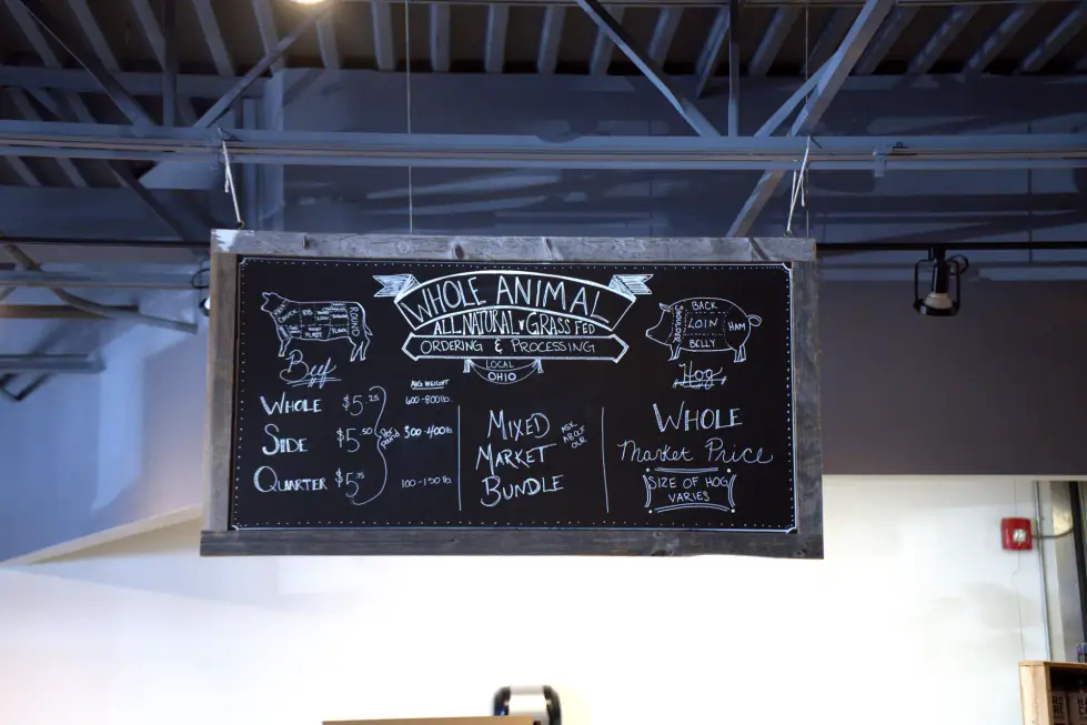 The Whole Animal, All Natural and Grass Fed chalkboard in the shop